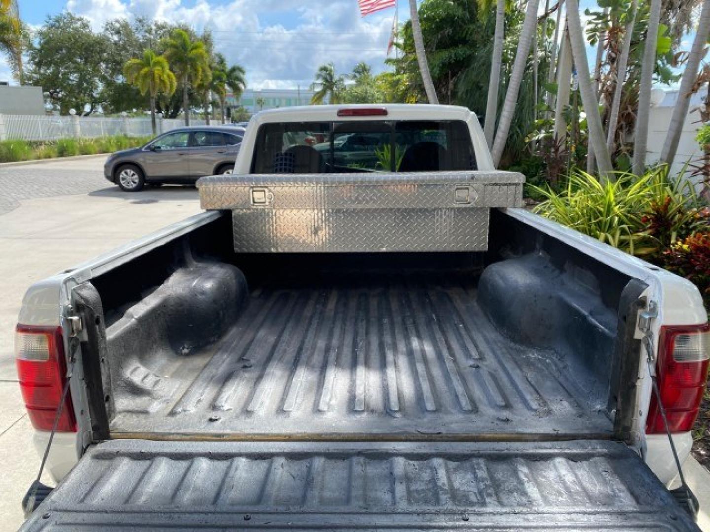 2002 Oxford White /Dark Graphite Ford Ranger XL AUTO AC LOW MILES 40,403 (1FTYR10D42T) with an 2.3L DOHC SEFI 16-Valve 4-Cyl Engine engine, Automatic transmission, located at 4701 North Dixie Hwy, Pompano Beach, FL, 33064, (954) 422-2889, 26.240938, -80.123474 - OUR WEBPAGE FLORIDACARS1.COM HAS OVER 100 PHOTOS AND FREE CARFAX LINK 2002 Ford Ranger XL Pickup 2.3L I4 F Gasoline 28 MPG Rear Wheel Drive Features ABS Brakes Air Conditioning AM/FM Stereo Automatic Transmission Vinyl Seats Power Locks Power Mirrors Power Windows 2002 Ford Ranger XL is a fantastic- Photo#87
