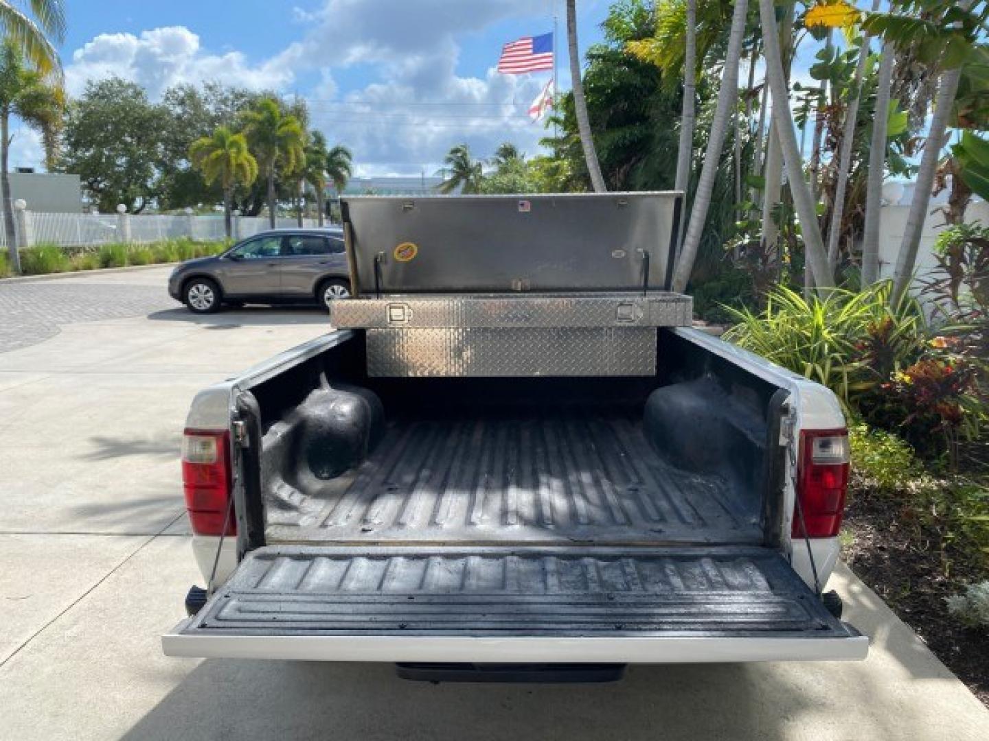 2002 Oxford White /Dark Graphite Ford Ranger XL AUTO AC LOW MILES 40,403 (1FTYR10D42T) with an 2.3L DOHC SEFI 16-Valve 4-Cyl Engine engine, Automatic transmission, located at 4701 North Dixie Hwy, Pompano Beach, FL, 33064, (954) 422-2889, 26.240938, -80.123474 - OUR WEBPAGE FLORIDACARS1.COM HAS OVER 100 PHOTOS AND FREE CARFAX LINK 2002 Ford Ranger XL Pickup 2.3L I4 F Gasoline 28 MPG Rear Wheel Drive Features ABS Brakes Air Conditioning AM/FM Stereo Automatic Transmission Vinyl Seats Power Locks Power Mirrors Power Windows 2002 Ford Ranger XL is a fantastic- Photo#95