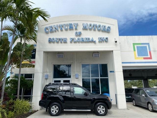 2009 Super Black /Steel Nissan Xterra S LOW MILES 50,980 1 OWNER 4WD (5N1AN08W69C) with an 4.0L V6 Cylinder Engine engine, Automatic transmission, located at 4701 North Dixie Hwy, Pompano Beach, FL, 33064, (954) 422-2889, 26.240938, -80.123474 - OUR WEBPAGE FLORIDACARS1.COM HAS OVER 100 PHOTOS AND FREE CARFAX LINK 2009 Nissan Xterra S 1 OWNER MANUAL TRANSMISSION 4 Door Wagon/Sport Utility 4.0L V6 F DOHC 24V Gasoline 20 MPG Rear Wheel Drive w/ 4X4 Features 4WD/AWD ABS Brakes Air Conditioning Alloy Wheels AM/FM Stereo Automatic Transmission A- Photo#0