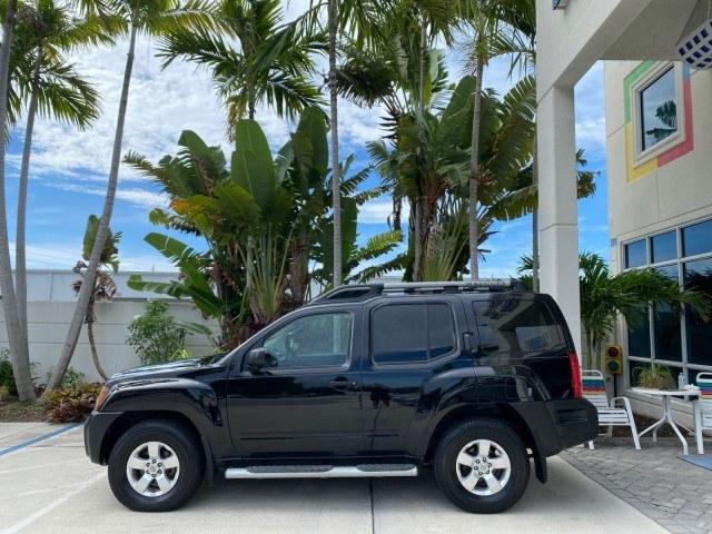 2009 Super Black /Steel Nissan Xterra S LOW MILES 50,980 1 OWNER 4WD (5N1AN08W69C) with an 4.0L V6 Cylinder Engine engine, Automatic transmission, located at 4701 North Dixie Hwy, Pompano Beach, FL, 33064, (954) 422-2889, 26.240938, -80.123474 - OUR WEBPAGE FLORIDACARS1.COM HAS OVER 100 PHOTOS AND FREE CARFAX LINK 2009 Nissan Xterra S 1 OWNER MANUAL TRANSMISSION 4 Door Wagon/Sport Utility 4.0L V6 F DOHC 24V Gasoline 20 MPG Rear Wheel Drive w/ 4X4 Features 4WD/AWD ABS Brakes Air Conditioning Alloy Wheels AM/FM Stereo Automatic Transmission A- Photo#4