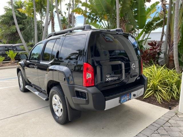 2009 Super Black /Steel Nissan Xterra S LOW MILES 50,980 1 OWNER 4WD (5N1AN08W69C) with an 4.0L V6 Cylinder Engine engine, Automatic transmission, located at 4701 North Dixie Hwy, Pompano Beach, FL, 33064, (954) 422-2889, 26.240938, -80.123474 - OUR WEBPAGE FLORIDACARS1.COM HAS OVER 100 PHOTOS AND FREE CARFAX LINK 2009 Nissan Xterra S 1 OWNER MANUAL TRANSMISSION 4 Door Wagon/Sport Utility 4.0L V6 F DOHC 24V Gasoline 20 MPG Rear Wheel Drive w/ 4X4 Features 4WD/AWD ABS Brakes Air Conditioning Alloy Wheels AM/FM Stereo Automatic Transmission A- Photo#5