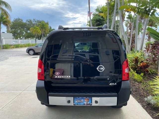 2009 Super Black /Steel Nissan Xterra S LOW MILES 50,980 1 OWNER 4WD (5N1AN08W69C) with an 4.0L V6 Cylinder Engine engine, Automatic transmission, located at 4701 North Dixie Hwy, Pompano Beach, FL, 33064, (954) 422-2889, 26.240938, -80.123474 - OUR WEBPAGE FLORIDACARS1.COM HAS OVER 100 PHOTOS AND FREE CARFAX LINK 2009 Nissan Xterra S 1 OWNER MANUAL TRANSMISSION 4 Door Wagon/Sport Utility 4.0L V6 F DOHC 24V Gasoline 20 MPG Rear Wheel Drive w/ 4X4 Features 4WD/AWD ABS Brakes Air Conditioning Alloy Wheels AM/FM Stereo Automatic Transmission A- Photo#6