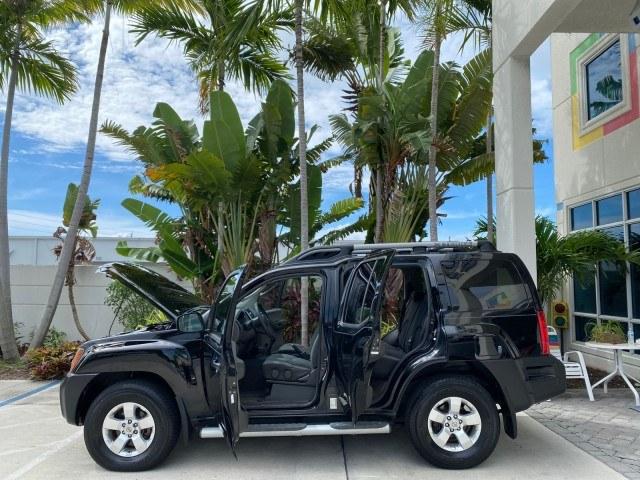 2009 Super Black /Steel Nissan Xterra S LOW MILES 50,980 1 OWNER 4WD (5N1AN08W69C) with an 4.0L V6 Cylinder Engine engine, Automatic transmission, located at 4701 North Dixie Hwy, Pompano Beach, FL, 33064, (954) 422-2889, 26.240938, -80.123474 - OUR WEBPAGE FLORIDACARS1.COM HAS OVER 100 PHOTOS AND FREE CARFAX LINK 2009 Nissan Xterra S 1 OWNER MANUAL TRANSMISSION 4 Door Wagon/Sport Utility 4.0L V6 F DOHC 24V Gasoline 20 MPG Rear Wheel Drive w/ 4X4 Features 4WD/AWD ABS Brakes Air Conditioning Alloy Wheels AM/FM Stereo Automatic Transmission A- Photo#8