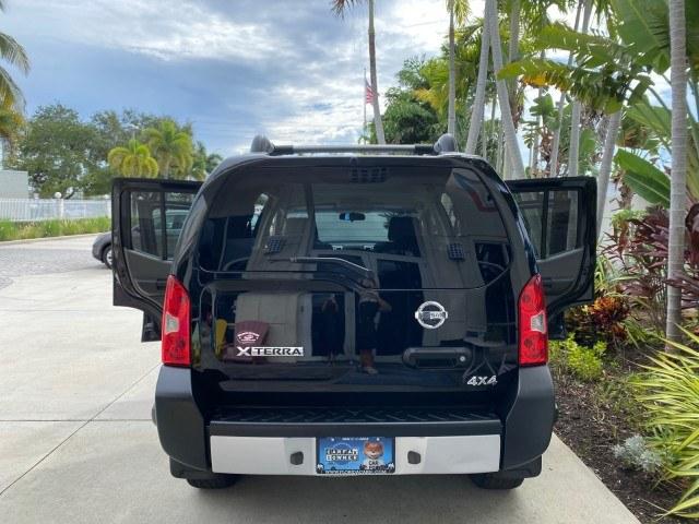 2009 Super Black /Steel Nissan Xterra S LOW MILES 50,980 1 OWNER 4WD (5N1AN08W69C) with an 4.0L V6 Cylinder Engine engine, Automatic transmission, located at 4701 North Dixie Hwy, Pompano Beach, FL, 33064, (954) 422-2889, 26.240938, -80.123474 - OUR WEBPAGE FLORIDACARS1.COM HAS OVER 100 PHOTOS AND FREE CARFAX LINK 2009 Nissan Xterra S 1 OWNER MANUAL TRANSMISSION 4 Door Wagon/Sport Utility 4.0L V6 F DOHC 24V Gasoline 20 MPG Rear Wheel Drive w/ 4X4 Features 4WD/AWD ABS Brakes Air Conditioning Alloy Wheels AM/FM Stereo Automatic Transmission A- Photo#15