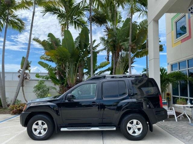 2009 Super Black /Steel Nissan Xterra S LOW MILES 50,980 1 OWNER 4WD (5N1AN08W69C) with an 4.0L V6 Cylinder Engine engine, Automatic transmission, located at 4701 North Dixie Hwy, Pompano Beach, FL, 33064, (954) 422-2889, 26.240938, -80.123474 - OUR WEBPAGE FLORIDACARS1.COM HAS OVER 100 PHOTOS AND FREE CARFAX LINK 2009 Nissan Xterra S 1 OWNER MANUAL TRANSMISSION 4 Door Wagon/Sport Utility 4.0L V6 F DOHC 24V Gasoline 20 MPG Rear Wheel Drive w/ 4X4 Features 4WD/AWD ABS Brakes Air Conditioning Alloy Wheels AM/FM Stereo Automatic Transmission A- Photo#30
