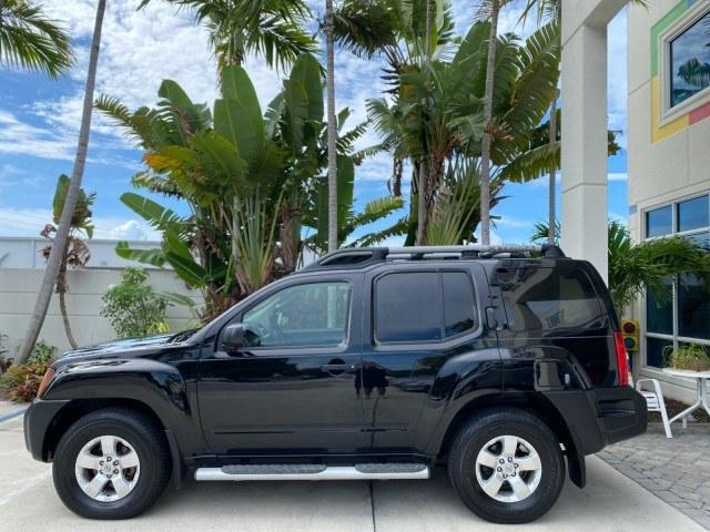 2009 Super Black /Steel Nissan Xterra S LOW MILES 50,980 1 OWNER 4WD (5N1AN08W69C) with an 4.0L V6 Cylinder Engine engine, Automatic transmission, located at 4701 North Dixie Hwy, Pompano Beach, FL, 33064, (954) 422-2889, 26.240938, -80.123474 - OUR WEBPAGE FLORIDACARS1.COM HAS OVER 100 PHOTOS AND FREE CARFAX LINK 2009 Nissan Xterra S 1 OWNER MANUAL TRANSMISSION 4 Door Wagon/Sport Utility 4.0L V6 F DOHC 24V Gasoline 20 MPG Rear Wheel Drive w/ 4X4 Features 4WD/AWD ABS Brakes Air Conditioning Alloy Wheels AM/FM Stereo Automatic Transmission A- Photo#31