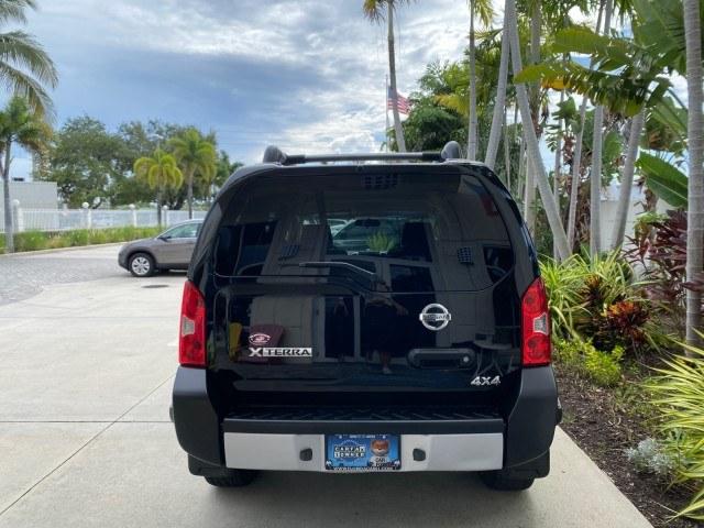 2009 Super Black /Steel Nissan Xterra S LOW MILES 50,980 1 OWNER 4WD (5N1AN08W69C) with an 4.0L V6 Cylinder Engine engine, Automatic transmission, located at 4701 North Dixie Hwy, Pompano Beach, FL, 33064, (954) 422-2889, 26.240938, -80.123474 - OUR WEBPAGE FLORIDACARS1.COM HAS OVER 100 PHOTOS AND FREE CARFAX LINK 2009 Nissan Xterra S 1 OWNER MANUAL TRANSMISSION 4 Door Wagon/Sport Utility 4.0L V6 F DOHC 24V Gasoline 20 MPG Rear Wheel Drive w/ 4X4 Features 4WD/AWD ABS Brakes Air Conditioning Alloy Wheels AM/FM Stereo Automatic Transmission A- Photo#34