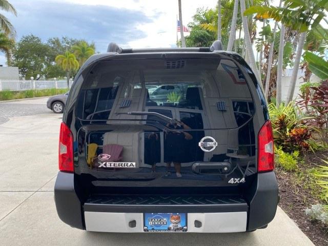 2009 Super Black /Steel Nissan Xterra S LOW MILES 50,980 1 OWNER 4WD (5N1AN08W69C) with an 4.0L V6 Cylinder Engine engine, Automatic transmission, located at 4701 North Dixie Hwy, Pompano Beach, FL, 33064, (954) 422-2889, 26.240938, -80.123474 - OUR WEBPAGE FLORIDACARS1.COM HAS OVER 100 PHOTOS AND FREE CARFAX LINK 2009 Nissan Xterra S 1 OWNER MANUAL TRANSMISSION 4 Door Wagon/Sport Utility 4.0L V6 F DOHC 24V Gasoline 20 MPG Rear Wheel Drive w/ 4X4 Features 4WD/AWD ABS Brakes Air Conditioning Alloy Wheels AM/FM Stereo Automatic Transmission A- Photo#35