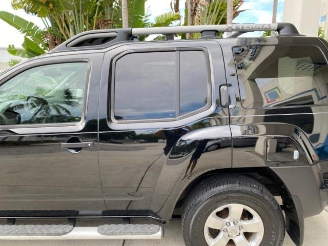 2009 Super Black /Steel Nissan Xterra S LOW MILES 50,980 1 OWNER 4WD (5N1AN08W69C) with an 4.0L V6 Cylinder Engine engine, Automatic transmission, located at 4701 North Dixie Hwy, Pompano Beach, FL, 33064, (954) 422-2889, 26.240938, -80.123474 - OUR WEBPAGE FLORIDACARS1.COM HAS OVER 100 PHOTOS AND FREE CARFAX LINK 2009 Nissan Xterra S 1 OWNER MANUAL TRANSMISSION 4 Door Wagon/Sport Utility 4.0L V6 F DOHC 24V Gasoline 20 MPG Rear Wheel Drive w/ 4X4 Features 4WD/AWD ABS Brakes Air Conditioning Alloy Wheels AM/FM Stereo Automatic Transmission A- Photo#72