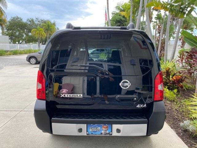 2009 Super Black /Steel Nissan Xterra S LOW MILES 50,980 1 OWNER 4WD (5N1AN08W69C) with an 4.0L V6 Cylinder Engine engine, Automatic transmission, located at 4701 North Dixie Hwy, Pompano Beach, FL, 33064, (954) 422-2889, 26.240938, -80.123474 - OUR WEBPAGE FLORIDACARS1.COM HAS OVER 100 PHOTOS AND FREE CARFAX LINK 2009 Nissan Xterra S 1 OWNER MANUAL TRANSMISSION 4 Door Wagon/Sport Utility 4.0L V6 F DOHC 24V Gasoline 20 MPG Rear Wheel Drive w/ 4X4 Features 4WD/AWD ABS Brakes Air Conditioning Alloy Wheels AM/FM Stereo Automatic Transmission A- Photo#88