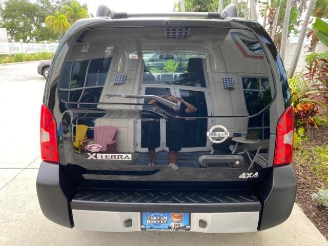 2009 Super Black /Steel Nissan Xterra S LOW MILES 50,980 1 OWNER 4WD (5N1AN08W69C) with an 4.0L V6 Cylinder Engine engine, Automatic transmission, located at 4701 North Dixie Hwy, Pompano Beach, FL, 33064, (954) 422-2889, 26.240938, -80.123474 - OUR WEBPAGE FLORIDACARS1.COM HAS OVER 100 PHOTOS AND FREE CARFAX LINK 2009 Nissan Xterra S 1 OWNER MANUAL TRANSMISSION 4 Door Wagon/Sport Utility 4.0L V6 F DOHC 24V Gasoline 20 MPG Rear Wheel Drive w/ 4X4 Features 4WD/AWD ABS Brakes Air Conditioning Alloy Wheels AM/FM Stereo Automatic Transmission A- Photo#89