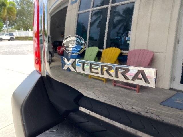 2009 Super Black /Steel Nissan Xterra S LOW MILES 50,980 1 OWNER 4WD (5N1AN08W69C) with an 4.0L V6 Cylinder Engine engine, Automatic transmission, located at 4701 North Dixie Hwy, Pompano Beach, FL, 33064, (954) 422-2889, 26.240938, -80.123474 - OUR WEBPAGE FLORIDACARS1.COM HAS OVER 100 PHOTOS AND FREE CARFAX LINK 2009 Nissan Xterra S 1 OWNER MANUAL TRANSMISSION 4 Door Wagon/Sport Utility 4.0L V6 F DOHC 24V Gasoline 20 MPG Rear Wheel Drive w/ 4X4 Features 4WD/AWD ABS Brakes Air Conditioning Alloy Wheels AM/FM Stereo Automatic Transmission A- Photo#92