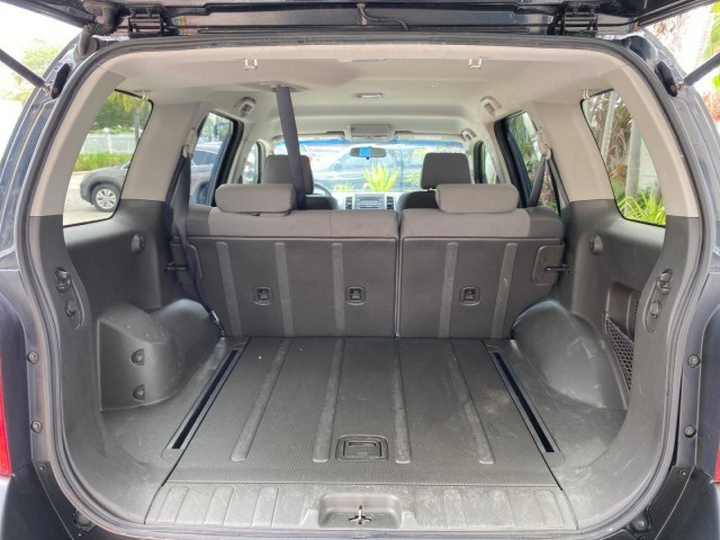 2009 Super Black /Steel Nissan Xterra 6 SPDLOW MILES 50,980 1 OWNER 4WD (5N1AN08W69C) with an 4.0L V6 Cylinder Engine engine, Manual transmission, located at 4701 North Dixie Hwy, Pompano Beach, FL, 33064, (954) 422-2889, 26.240938, -80.123474 - OUR WEBPAGE FLORIDACARS1.COM HAS OVER 100 PHOTOS AND FREE CARFAX LINK 2009 Nissan Xterra S 1 OWNER MANUAL TRANSMISSION 4 Door Wagon/Sport Utility 4.0L V6 F DOHC 24V Gasoline 20 MPG Rear Wheel Drive w/ 4X4 Features 4WD/AWD ABS Brakes Air Conditioning Alloy Wheels AM/FM Stereo Automatic Transmission A- Photo#95