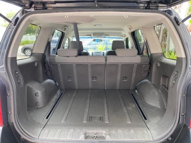 2009 Super Black /Steel Nissan Xterra S LOW MILES 50,980 1 OWNER 4WD (5N1AN08W69C) with an 4.0L V6 Cylinder Engine engine, Automatic transmission, located at 4701 North Dixie Hwy, Pompano Beach, FL, 33064, (954) 422-2889, 26.240938, -80.123474 - OUR WEBPAGE FLORIDACARS1.COM HAS OVER 100 PHOTOS AND FREE CARFAX LINK 2009 Nissan Xterra S 1 OWNER MANUAL TRANSMISSION 4 Door Wagon/Sport Utility 4.0L V6 F DOHC 24V Gasoline 20 MPG Rear Wheel Drive w/ 4X4 Features 4WD/AWD ABS Brakes Air Conditioning Alloy Wheels AM/FM Stereo Automatic Transmission A- Photo#95