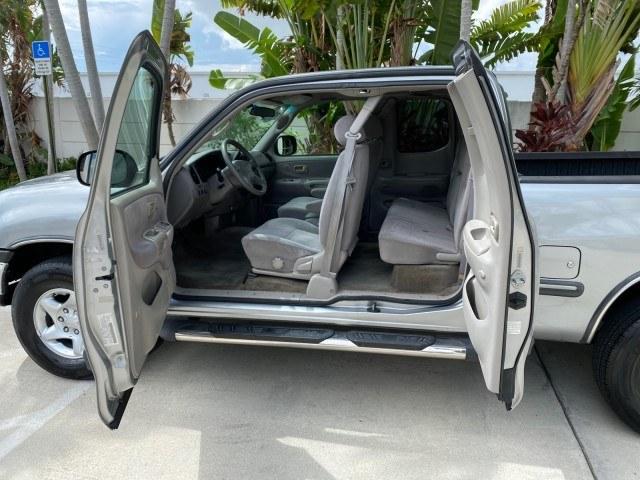 2002 Desert Sand Metallic /Gray Toyota Tundra SR5 LOW MILES 94,632 1 OWNER (5TBRN34102S) with an 3.4L DOHC EFI 24-Valve V6 Engine engine, Automatic transmission, located at 4701 North Dixie Hwy, Pompano Beach, FL, 33064, (954) 422-2889, 26.240938, -80.123474 - OUR WEBPAGE FLORIDACARS1.COM HAS OVER 100 PHOTOS AND FREE CARFAX LINK 2002 Toyota Tundra SR5 1 OWNER 4 Door Extended Cab Pickup 3.4L V6 F DOHC 24V Gasoline 16 MPG Rear Wheel Drive Features Air Conditioning AM/FM Stereo Automatic Transmission Bed Liner Cassette Player CD Audio Cloth Seats Cruise Cont- Photo#74