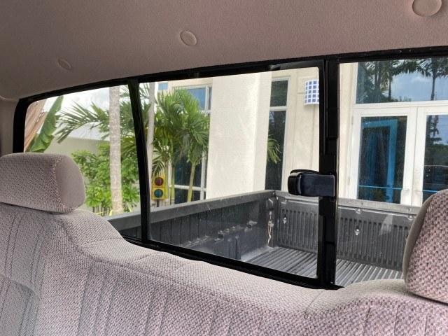 2002 Desert Sand Metallic /Gray Toyota Tundra SR5 LOW MILES 94,632 1 OWNER (5TBRN34102S) with an 3.4L DOHC EFI 24-Valve V6 Engine engine, Automatic transmission, located at 4701 North Dixie Hwy, Pompano Beach, FL, 33064, (954) 422-2889, 26.240938, -80.123474 - OUR WEBPAGE FLORIDACARS1.COM HAS OVER 100 PHOTOS AND FREE CARFAX LINK 2002 Toyota Tundra SR5 1 OWNER 4 Door Extended Cab Pickup 3.4L V6 F DOHC 24V Gasoline 16 MPG Rear Wheel Drive Features Air Conditioning AM/FM Stereo Automatic Transmission Bed Liner Cassette Player CD Audio Cloth Seats Cruise Cont- Photo#80