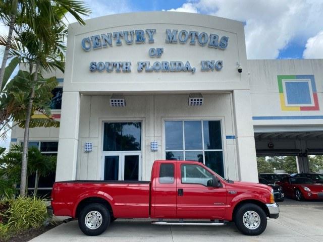 2001 Red /Medium Graphite Ford Super Duty F-250 7.3 TURBO DIESEL XL 1 OWNER (3FTNX20F31M) with an 7.3L DI V8 Turbo-Diesel Power Stroke Engine engine, Automatic transmission, located at 4701 North Dixie Hwy, Pompano Beach, FL, 33064, (954) 422-2889, 26.240938, -80.123474 - OUR WEBPAGE FLORIDACARS1.COM HAS OVER 100 PHOTOS AND FREE CARFAX LINK 2001 Ford F-250 Super Duty Lariat 1 OWNER 4 Door Extended Cab Pickup 7.3L V8 F Diesel Rear Wheel Drive Features ABS Brakes Air Conditioning Alloy Wheels AM/FM Stereo Automatic Transmission CD Audio Cruise Control Cloth Seats Overh- Photo#0