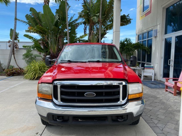 2001 Red /Medium Graphite Ford Super Duty F-250 7.3 TURBO DIESEL XL 1 OWNER (3FTNX20F31M) with an 7.3L DI V8 Turbo-Diesel Power Stroke Engine engine, Automatic transmission, located at 4701 North Dixie Hwy, Pompano Beach, FL, 33064, (954) 422-2889, 26.240938, -80.123474 - OUR WEBPAGE FLORIDACARS1.COM HAS OVER 100 PHOTOS AND FREE CARFAX LINK 2001 Ford F-250 Super Duty Lariat 1 OWNER 4 Door Extended Cab Pickup 7.3L V8 F Diesel Rear Wheel Drive Features ABS Brakes Air Conditioning Alloy Wheels AM/FM Stereo Automatic Transmission CD Audio Cruise Control Cloth Seats Overh- Photo#2