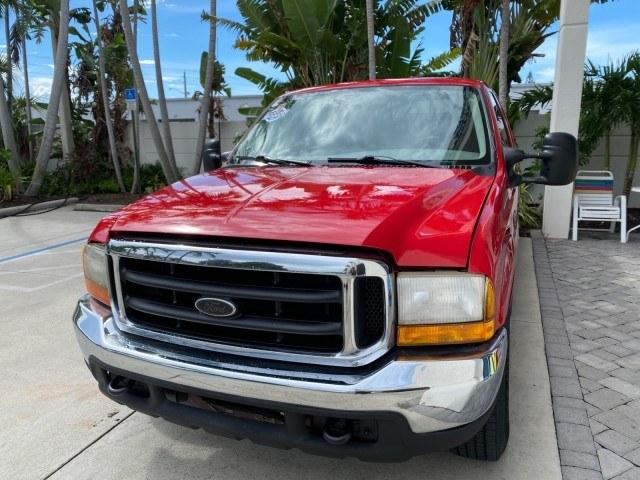 2001 Red /Medium Graphite Ford Super Duty F-250 7.3 TURBO DIESEL XL 1 OWNER (3FTNX20F31M) with an 7.3L DI V8 Turbo-Diesel Power Stroke Engine engine, Automatic transmission, located at 4701 North Dixie Hwy, Pompano Beach, FL, 33064, (954) 422-2889, 26.240938, -80.123474 - OUR WEBPAGE FLORIDACARS1.COM HAS OVER 100 PHOTOS AND FREE CARFAX LINK 2001 Ford F-250 Super Duty Lariat 1 OWNER 4 Door Extended Cab Pickup 7.3L V8 F Diesel Rear Wheel Drive Features ABS Brakes Air Conditioning Alloy Wheels AM/FM Stereo Automatic Transmission CD Audio Cruise Control Cloth Seats Overh- Photo#3