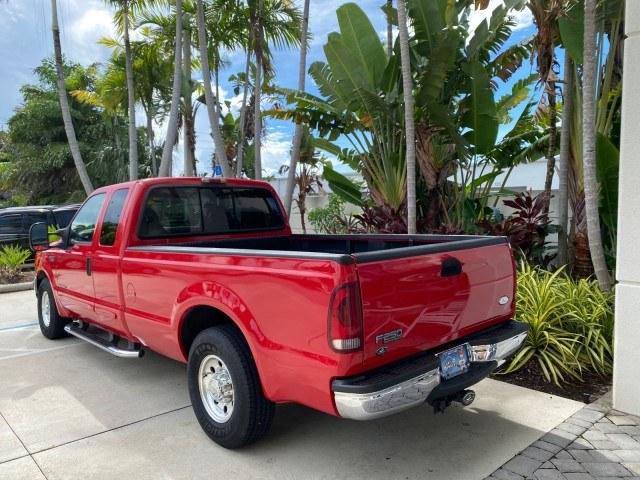 2001 Red /Medium Graphite Ford Super Duty F-250 7.3 TURBO DIESEL XL 1 OWNER (3FTNX20F31M) with an 7.3L DI V8 Turbo-Diesel Power Stroke Engine engine, Automatic transmission, located at 4701 North Dixie Hwy, Pompano Beach, FL, 33064, (954) 422-2889, 26.240938, -80.123474 - OUR WEBPAGE FLORIDACARS1.COM HAS OVER 100 PHOTOS AND FREE CARFAX LINK 2001 Ford F-250 Super Duty Lariat 1 OWNER 4 Door Extended Cab Pickup 7.3L V8 F Diesel Rear Wheel Drive Features ABS Brakes Air Conditioning Alloy Wheels AM/FM Stereo Automatic Transmission CD Audio Cruise Control Cloth Seats Overh- Photo#5