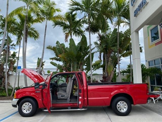 2001 Red /Medium Graphite Ford Super Duty F-250 7.3 TURBO DIESEL XL 1 OWNER (3FTNX20F31M) with an 7.3L DI V8 Turbo-Diesel Power Stroke Engine engine, Automatic transmission, located at 4701 North Dixie Hwy, Pompano Beach, FL, 33064, (954) 422-2889, 26.240938, -80.123474 - OUR WEBPAGE FLORIDACARS1.COM HAS OVER 100 PHOTOS AND FREE CARFAX LINK 2001 Ford F-250 Super Duty Lariat 1 OWNER 4 Door Extended Cab Pickup 7.3L V8 F Diesel Rear Wheel Drive Features ABS Brakes Air Conditioning Alloy Wheels AM/FM Stereo Automatic Transmission CD Audio Cruise Control Cloth Seats Overh- Photo#8