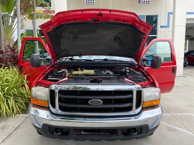 2001 Red /Medium Graphite Ford Super Duty F-250 7.3 TURBO DIESEL XL 1 OWNER (3FTNX20F31M) with an 7.3L DI V8 Turbo-Diesel Power Stroke Engine engine, Automatic transmission, located at 4701 North Dixie Hwy, Pompano Beach, FL, 33064, (954) 422-2889, 26.240938, -80.123474 - OUR WEBPAGE FLORIDACARS1.COM HAS OVER 100 PHOTOS AND FREE CARFAX LINK 2001 Ford F-250 Super Duty Lariat 1 OWNER 4 Door Extended Cab Pickup 7.3L V8 F Diesel Rear Wheel Drive Features ABS Brakes Air Conditioning Alloy Wheels AM/FM Stereo Automatic Transmission CD Audio Cruise Control Cloth Seats Overh- Photo#17