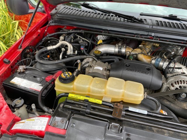 2001 Red /Medium Graphite Ford Super Duty F-250 7.3 TURBO DIESEL XL 1 OWNER (3FTNX20F31M) with an 7.3L DI V8 Turbo-Diesel Power Stroke Engine engine, Automatic transmission, located at 4701 North Dixie Hwy, Pompano Beach, FL, 33064, (954) 422-2889, 26.240938, -80.123474 - OUR WEBPAGE FLORIDACARS1.COM HAS OVER 100 PHOTOS AND FREE CARFAX LINK 2001 Ford F-250 Super Duty Lariat 1 OWNER 4 Door Extended Cab Pickup 7.3L V8 F Diesel Rear Wheel Drive Features ABS Brakes Air Conditioning Alloy Wheels AM/FM Stereo Automatic Transmission CD Audio Cruise Control Cloth Seats Overh- Photo#24