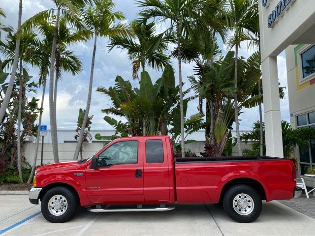 2001 Red /Medium Graphite Ford Super Duty F-250 7.3 TURBO DIESEL XL 1 OWNER (3FTNX20F31M) with an 7.3L DI V8 Turbo-Diesel Power Stroke Engine engine, Automatic transmission, located at 4701 North Dixie Hwy, Pompano Beach, FL, 33064, (954) 422-2889, 26.240938, -80.123474 - OUR WEBPAGE FLORIDACARS1.COM HAS OVER 100 PHOTOS AND FREE CARFAX LINK 2001 Ford F-250 Super Duty Lariat 1 OWNER 4 Door Extended Cab Pickup 7.3L V8 F Diesel Rear Wheel Drive Features ABS Brakes Air Conditioning Alloy Wheels AM/FM Stereo Automatic Transmission CD Audio Cruise Control Cloth Seats Overh- Photo#30