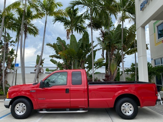 2001 Red /Medium Graphite Ford Super Duty F-250 7.3 TURBO DIESEL XL 1 OWNER (3FTNX20F31M) with an 7.3L DI V8 Turbo-Diesel Power Stroke Engine engine, Automatic transmission, located at 4701 North Dixie Hwy, Pompano Beach, FL, 33064, (954) 422-2889, 26.240938, -80.123474 - OUR WEBPAGE FLORIDACARS1.COM HAS OVER 100 PHOTOS AND FREE CARFAX LINK 2001 Ford F-250 Super Duty Lariat 1 OWNER 4 Door Extended Cab Pickup 7.3L V8 F Diesel Rear Wheel Drive Features ABS Brakes Air Conditioning Alloy Wheels AM/FM Stereo Automatic Transmission CD Audio Cruise Control Cloth Seats Overh- Photo#31