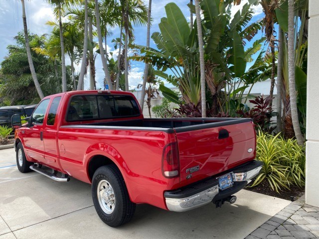 2001 Red /Medium Graphite Ford Super Duty F-250 7.3 TURBO DIESEL XL 1 OWNER (3FTNX20F31M) with an 7.3L DI V8 Turbo-Diesel Power Stroke Engine engine, Automatic transmission, located at 4701 North Dixie Hwy, Pompano Beach, FL, 33064, (954) 422-2889, 26.240938, -80.123474 - OUR WEBPAGE FLORIDACARS1.COM HAS OVER 100 PHOTOS AND FREE CARFAX LINK 2001 Ford F-250 Super Duty Lariat 1 OWNER 4 Door Extended Cab Pickup 7.3L V8 F Diesel Rear Wheel Drive Features ABS Brakes Air Conditioning Alloy Wheels AM/FM Stereo Automatic Transmission CD Audio Cruise Control Cloth Seats Overh- Photo#32