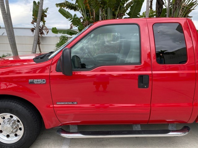 2001 Red /Medium Graphite Ford Super Duty F-250 7.3 TURBO DIESEL XL 1 OWNER (3FTNX20F31M) with an 7.3L DI V8 Turbo-Diesel Power Stroke Engine engine, Automatic transmission, located at 4701 North Dixie Hwy, Pompano Beach, FL, 33064, (954) 422-2889, 26.240938, -80.123474 - OUR WEBPAGE FLORIDACARS1.COM HAS OVER 100 PHOTOS AND FREE CARFAX LINK 2001 Ford F-250 Super Duty Lariat 1 OWNER 4 Door Extended Cab Pickup 7.3L V8 F Diesel Rear Wheel Drive Features ABS Brakes Air Conditioning Alloy Wheels AM/FM Stereo Automatic Transmission CD Audio Cruise Control Cloth Seats Overh- Photo#36