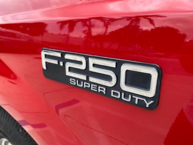 2001 Red /Medium Graphite Ford Super Duty F-250 7.3 TURBO DIESEL XL 1 OWNER (3FTNX20F31M) with an 7.3L DI V8 Turbo-Diesel Power Stroke Engine engine, Automatic transmission, located at 4701 North Dixie Hwy, Pompano Beach, FL, 33064, (954) 422-2889, 26.240938, -80.123474 - OUR WEBPAGE FLORIDACARS1.COM HAS OVER 100 PHOTOS AND FREE CARFAX LINK 2001 Ford F-250 Super Duty Lariat 1 OWNER 4 Door Extended Cab Pickup 7.3L V8 F Diesel Rear Wheel Drive Features ABS Brakes Air Conditioning Alloy Wheels AM/FM Stereo Automatic Transmission CD Audio Cruise Control Cloth Seats Overh- Photo#41