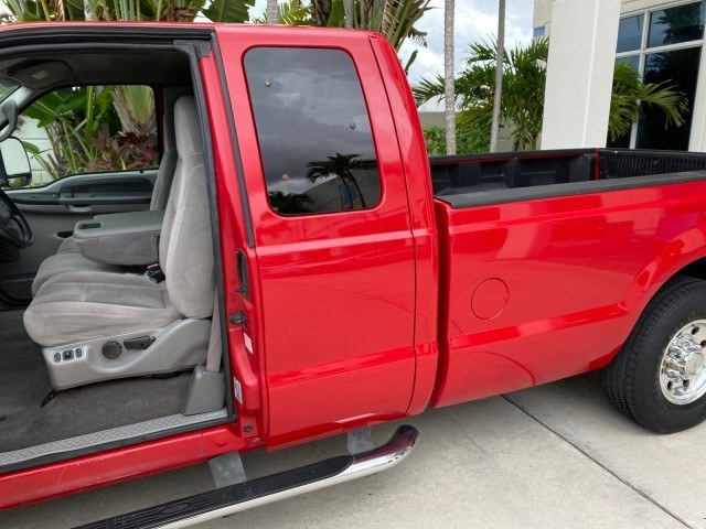 2001 Red /Medium Graphite Ford Super Duty F-250 7.3 TURBO DIESEL XL 1 OWNER (3FTNX20F31M) with an 7.3L DI V8 Turbo-Diesel Power Stroke Engine engine, Automatic transmission, located at 4701 North Dixie Hwy, Pompano Beach, FL, 33064, (954) 422-2889, 26.240938, -80.123474 - OUR WEBPAGE FLORIDACARS1.COM HAS OVER 100 PHOTOS AND FREE CARFAX LINK 2001 Ford F-250 Super Duty Lariat 1 OWNER 4 Door Extended Cab Pickup 7.3L V8 F Diesel Rear Wheel Drive Features ABS Brakes Air Conditioning Alloy Wheels AM/FM Stereo Automatic Transmission CD Audio Cruise Control Cloth Seats Overh- Photo#68