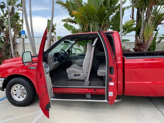 2001 Red /Medium Graphite Ford Super Duty F-250 7.3 TURBO DIESEL XL 1 OWNER (3FTNX20F31M) with an 7.3L DI V8 Turbo-Diesel Power Stroke Engine engine, Automatic transmission, located at 4701 North Dixie Hwy, Pompano Beach, FL, 33064, (954) 422-2889, 26.240938, -80.123474 - OUR WEBPAGE FLORIDACARS1.COM HAS OVER 100 PHOTOS AND FREE CARFAX LINK 2001 Ford F-250 Super Duty Lariat 1 OWNER 4 Door Extended Cab Pickup 7.3L V8 F Diesel Rear Wheel Drive Features ABS Brakes Air Conditioning Alloy Wheels AM/FM Stereo Automatic Transmission CD Audio Cruise Control Cloth Seats Overh- Photo#70