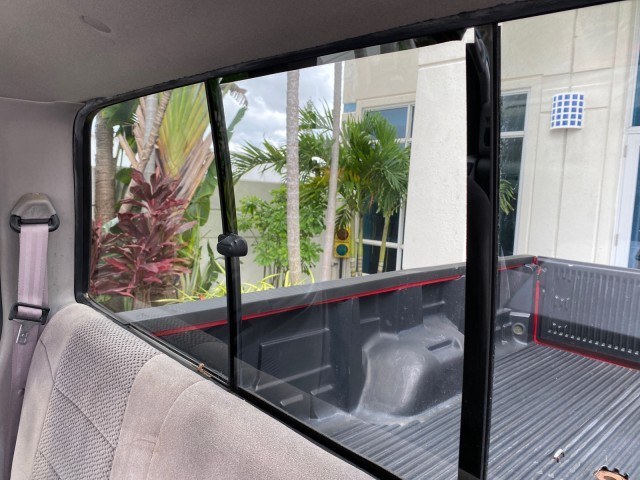 2001 Red /Medium Graphite Ford Super Duty F-250 7.3 TURBO DIESEL XL 1 OWNER (3FTNX20F31M) with an 7.3L DI V8 Turbo-Diesel Power Stroke Engine engine, Automatic transmission, located at 4701 North Dixie Hwy, Pompano Beach, FL, 33064, (954) 422-2889, 26.240938, -80.123474 - OUR WEBPAGE FLORIDACARS1.COM HAS OVER 100 PHOTOS AND FREE CARFAX LINK 2001 Ford F-250 Super Duty Lariat 1 OWNER 4 Door Extended Cab Pickup 7.3L V8 F Diesel Rear Wheel Drive Features ABS Brakes Air Conditioning Alloy Wheels AM/FM Stereo Automatic Transmission CD Audio Cruise Control Cloth Seats Overh- Photo#77