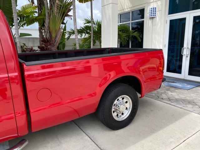 2001 Red /Medium Graphite Ford Super Duty F-250 7.3 TURBO DIESEL XL 1 OWNER (3FTNX20F31M) with an 7.3L DI V8 Turbo-Diesel Power Stroke Engine engine, Automatic transmission, located at 4701 North Dixie Hwy, Pompano Beach, FL, 33064, (954) 422-2889, 26.240938, -80.123474 - OUR WEBPAGE FLORIDACARS1.COM HAS OVER 100 PHOTOS AND FREE CARFAX LINK 2001 Ford F-250 Super Duty Lariat 1 OWNER 4 Door Extended Cab Pickup 7.3L V8 F Diesel Rear Wheel Drive Features ABS Brakes Air Conditioning Alloy Wheels AM/FM Stereo Automatic Transmission CD Audio Cruise Control Cloth Seats Overh- Photo#79