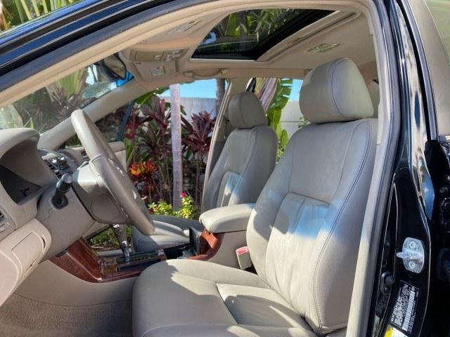 2005 Black /Taupe Toyota Camry XLE LOW MILES 76,231 1 OWNER (4T1BF32K25U) with an 3.0L DOHC MPFI Vvti 24-Valve V6 Engine engine, Automatic transmission, located at 4701 North Dixie Hwy, Pompano Beach, FL, 33064, (954) 422-2889, 26.240938, -80.123474 - OUR WEBPAGE FLORIDACARS1.COM HAS OVER 100 PHOTOS AND FREE CARFAX LINK 2005 Toyota Camry XLE V6 1 OWNER Sedan 4 DR 3.0L V6 F DOHC 24V Gasoline 28 MPG Front Wheel Drive Features ABS Brakes Air Conditioning Alloy Wheels AM/FM Stereo Automatic Transmission Cassette Player CD Audio Cruise Control JBL Sou- Photo#10