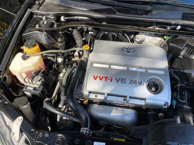 2005 Black /Taupe Toyota Camry XLE LOW MILES 76,231 1 OWNER (4T1BF32K25U) with an 3.0L DOHC MPFI Vvti 24-Valve V6 Engine engine, Automatic transmission, located at 4701 North Dixie Hwy, Pompano Beach, FL, 33064, (954) 422-2889, 26.240938, -80.123474 - OUR WEBPAGE FLORIDACARS1.COM HAS OVER 100 PHOTOS AND FREE CARFAX LINK 2005 Toyota Camry XLE V6 1 OWNER Sedan 4 DR 3.0L V6 F DOHC 24V Gasoline 28 MPG Front Wheel Drive Features ABS Brakes Air Conditioning Alloy Wheels AM/FM Stereo Automatic Transmission Cassette Player CD Audio Cruise Control JBL Sou- Photo#24