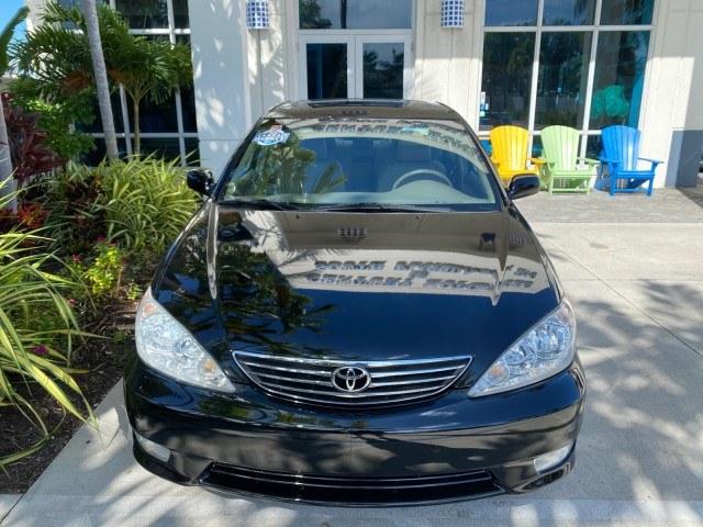 2005 Black /Taupe Toyota Camry XLE LOW MILES 76,231 1 OWNER (4T1BF32K25U) with an 3.0L DOHC MPFI Vvti 24-Valve V6 Engine engine, Automatic transmission, located at 4701 North Dixie Hwy, Pompano Beach, FL, 33064, (954) 422-2889, 26.240938, -80.123474 - OUR WEBPAGE FLORIDACARS1.COM HAS OVER 100 PHOTOS AND FREE CARFAX LINK 2005 Toyota Camry XLE V6 1 OWNER Sedan 4 DR 3.0L V6 F DOHC 24V Gasoline 28 MPG Front Wheel Drive Features ABS Brakes Air Conditioning Alloy Wheels AM/FM Stereo Automatic Transmission Cassette Player CD Audio Cruise Control JBL Sou- Photo#27