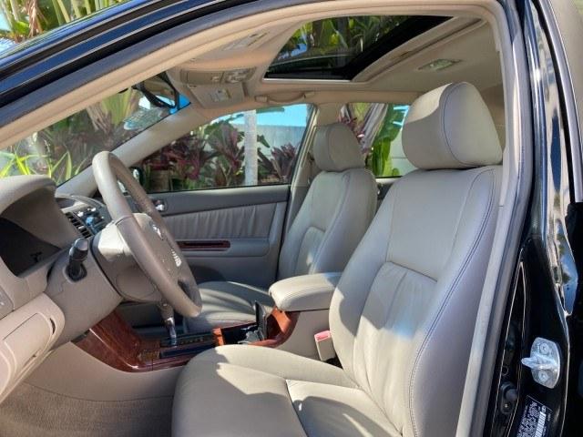 2005 Black /Taupe Toyota Camry XLE LOW MILES 76,231 1 OWNER (4T1BF32K25U) with an 3.0L DOHC MPFI Vvti 24-Valve V6 Engine engine, Automatic transmission, located at 4701 North Dixie Hwy, Pompano Beach, FL, 33064, (954) 422-2889, 26.240938, -80.123474 - OUR WEBPAGE FLORIDACARS1.COM HAS OVER 100 PHOTOS AND FREE CARFAX LINK 2005 Toyota Camry XLE V6 1 OWNER Sedan 4 DR 3.0L V6 F DOHC 24V Gasoline 28 MPG Front Wheel Drive Features ABS Brakes Air Conditioning Alloy Wheels AM/FM Stereo Automatic Transmission Cassette Player CD Audio Cruise Control JBL Sou- Photo#43