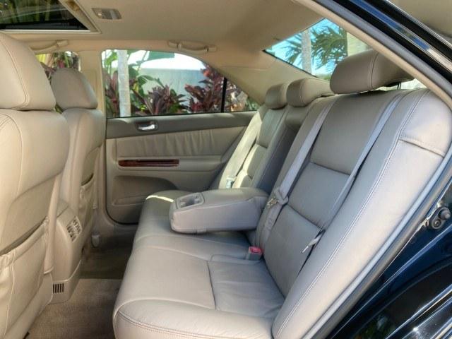 2005 Black /Taupe Toyota Camry XLE LOW MILES 76,231 1 OWNER (4T1BF32K25U) with an 3.0L DOHC MPFI Vvti 24-Valve V6 Engine engine, Automatic transmission, located at 4701 North Dixie Hwy, Pompano Beach, FL, 33064, (954) 422-2889, 26.240938, -80.123474 - OUR WEBPAGE FLORIDACARS1.COM HAS OVER 100 PHOTOS AND FREE CARFAX LINK 2005 Toyota Camry XLE V6 1 OWNER Sedan 4 DR 3.0L V6 F DOHC 24V Gasoline 28 MPG Front Wheel Drive Features ABS Brakes Air Conditioning Alloy Wheels AM/FM Stereo Automatic Transmission Cassette Player CD Audio Cruise Control JBL Sou- Photo#80