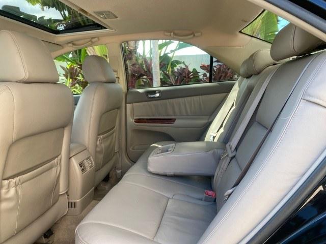 2005 Black /Taupe Toyota Camry XLE LOW MILES 76,231 1 OWNER (4T1BF32K25U) with an 3.0L DOHC MPFI Vvti 24-Valve V6 Engine engine, Automatic transmission, located at 4701 North Dixie Hwy, Pompano Beach, FL, 33064, (954) 422-2889, 26.240938, -80.123474 - OUR WEBPAGE FLORIDACARS1.COM HAS OVER 100 PHOTOS AND FREE CARFAX LINK 2005 Toyota Camry XLE V6 1 OWNER Sedan 4 DR 3.0L V6 F DOHC 24V Gasoline 28 MPG Front Wheel Drive Features ABS Brakes Air Conditioning Alloy Wheels AM/FM Stereo Automatic Transmission Cassette Player CD Audio Cruise Control JBL Sou- Photo#83