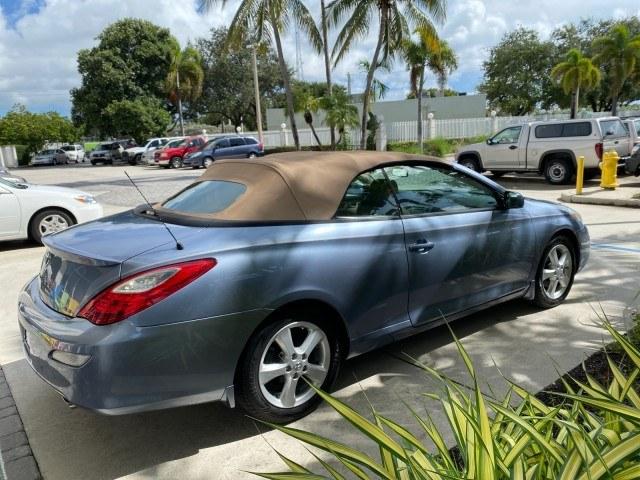 2007 Cosmic Blue Metallic /Ivory Toyota Camry Solara SLE LOW MILES 39,944 1 OWNER (4T1FA38P97U) with an 3.3L DOHC SMPI VVT-i 24-Valve V6 Engine engine, Automatic transmission, located at 4701 North Dixie Hwy, Pompano Beach, FL, 33064, (954) 422-2889, 26.240938, -80.123474 - OUR WEBPAGE FLORIDACARS1.COM HAS OVER 100 PHOTOS AND FREE CARFAX LINK 2007 Toyota Camry Solara SLE V6 1 OWNER Convertible 3.3L V6 F DOHC 24V Gasoline 29 MPG Front Wheel Drive Features ABS Brakes Air Conditioning Alloy Wheels AM/FM Stereo Automatic Transmission Auxiliary Audio Input Bluetooth Technol- Photo#7