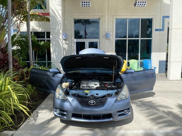 2007 Cosmic Blue Metallic /Ivory Toyota Camry Solara SLE LOW MILES 39,944 1 OWNER (4T1FA38P97U) with an 3.3L DOHC SMPI VVT-i 24-Valve V6 Engine engine, Automatic transmission, located at 4701 North Dixie Hwy, Pompano Beach, FL, 33064, (954) 422-2889, 26.240938, -80.123474 - OUR WEBPAGE FLORIDACARS1.COM HAS OVER 100 PHOTOS AND FREE CARFAX LINK 2007 Toyota Camry Solara SLE V6 1 OWNER Convertible 3.3L V6 F DOHC 24V Gasoline 29 MPG Front Wheel Drive Features ABS Brakes Air Conditioning Alloy Wheels AM/FM Stereo Automatic Transmission Auxiliary Audio Input Bluetooth Technol- Photo#16