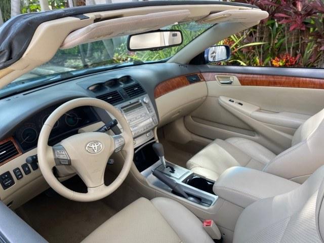 2007 Cosmic Blue Metallic /Ivory Toyota Camry Solara SLE LOW MILES 39,944 1 OWNER (4T1FA38P97U) with an 3.3L DOHC SMPI VVT-i 24-Valve V6 Engine engine, Automatic transmission, located at 4701 North Dixie Hwy, Pompano Beach, FL, 33064, (954) 422-2889, 26.240938, -80.123474 - OUR WEBPAGE FLORIDACARS1.COM HAS OVER 100 PHOTOS AND FREE CARFAX LINK 2007 Toyota Camry Solara SLE V6 1 OWNER Convertible 3.3L V6 F DOHC 24V Gasoline 29 MPG Front Wheel Drive Features ABS Brakes Air Conditioning Alloy Wheels AM/FM Stereo Automatic Transmission Auxiliary Audio Input Bluetooth Technol- Photo#52