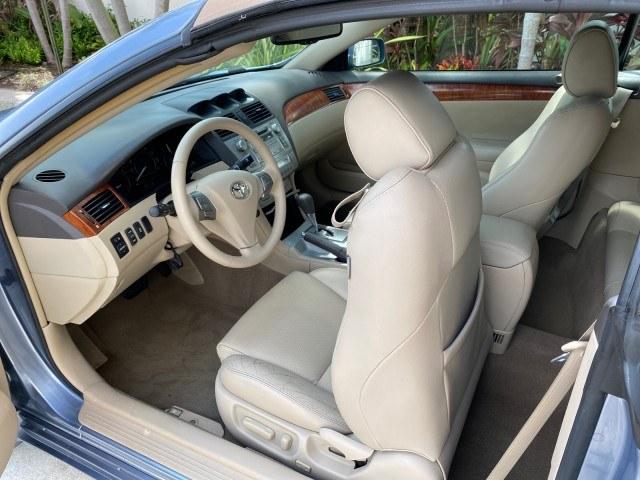 2007 Cosmic Blue Metallic /Ivory Toyota Camry Solara SLE LOW MILES 39,944 1 OWNER (4T1FA38P97U) with an 3.3L DOHC SMPI VVT-i 24-Valve V6 Engine engine, Automatic transmission, located at 4701 North Dixie Hwy, Pompano Beach, FL, 33064, (954) 422-2889, 26.240938, -80.123474 - OUR WEBPAGE FLORIDACARS1.COM HAS OVER 100 PHOTOS AND FREE CARFAX LINK 2007 Toyota Camry Solara SLE V6 1 OWNER Convertible 3.3L V6 F DOHC 24V Gasoline 29 MPG Front Wheel Drive Features ABS Brakes Air Conditioning Alloy Wheels AM/FM Stereo Automatic Transmission Auxiliary Audio Input Bluetooth Technol- Photo#94