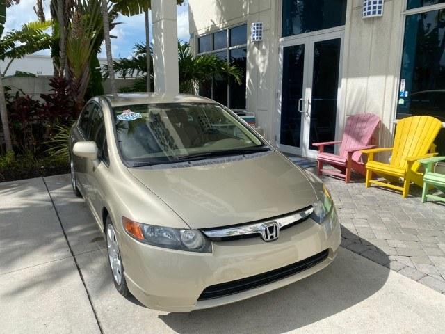 2007 Borrego Beige Metallic /Ivory Honda Civic Sdn LX LOW MILES 24,174 1 OWNER (1HGFA16547L) with an 1.8L SOHC MPFI 16-Valve i-VTEC I4 Engine engine, Automatic transmission, located at 4701 North Dixie Hwy, Pompano Beach, FL, 33064, (954) 422-2889, 26.240938, -80.123474 - OUR WEBPAGE FLORIDACARS1.COM HAS OVER 100 PHOTOS AND FREE CARFAX LINK 2007 Honda Civic LX 1 OWNER Sedan 4 DR 1.8L I4 F SOHC 16V Gasoline Front wheel drive Features ABS Brakes Air Conditioning AM/FM Stereo Automatic Transmission Auxiliary Audio Input CD Audio Cloth Seats Cruise Control Power Locks Po- Photo#1
