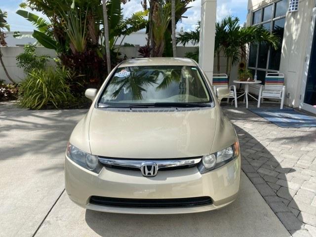 2007 Borrego Beige Metallic /Ivory Honda Civic Sdn LX LOW MILES 24,174 1 OWNER (1HGFA16547L) with an 1.8L SOHC MPFI 16-Valve i-VTEC I4 Engine engine, Automatic transmission, located at 4701 North Dixie Hwy, Pompano Beach, FL, 33064, (954) 422-2889, 26.240938, -80.123474 - OUR WEBPAGE FLORIDACARS1.COM HAS OVER 100 PHOTOS AND FREE CARFAX LINK 2007 Honda Civic LX 1 OWNER Sedan 4 DR 1.8L I4 F SOHC 16V Gasoline Front wheel drive Features ABS Brakes Air Conditioning AM/FM Stereo Automatic Transmission Auxiliary Audio Input CD Audio Cloth Seats Cruise Control Power Locks Po- Photo#2