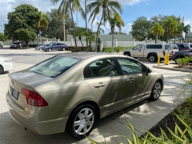 2007 Borrego Beige Metallic /Ivory Honda Civic Sdn LX LOW MILES 24,174 1 OWNER (1HGFA16547L) with an 1.8L SOHC MPFI 16-Valve i-VTEC I4 Engine engine, Automatic transmission, located at 4701 North Dixie Hwy, Pompano Beach, FL, 33064, (954) 422-2889, 26.240938, -80.123474 - OUR WEBPAGE FLORIDACARS1.COM HAS OVER 100 PHOTOS AND FREE CARFAX LINK 2007 Honda Civic LX 1 OWNER Sedan 4 DR 1.8L I4 F SOHC 16V Gasoline Front wheel drive Features ABS Brakes Air Conditioning AM/FM Stereo Automatic Transmission Auxiliary Audio Input CD Audio Cloth Seats Cruise Control Power Locks Po- Photo#7