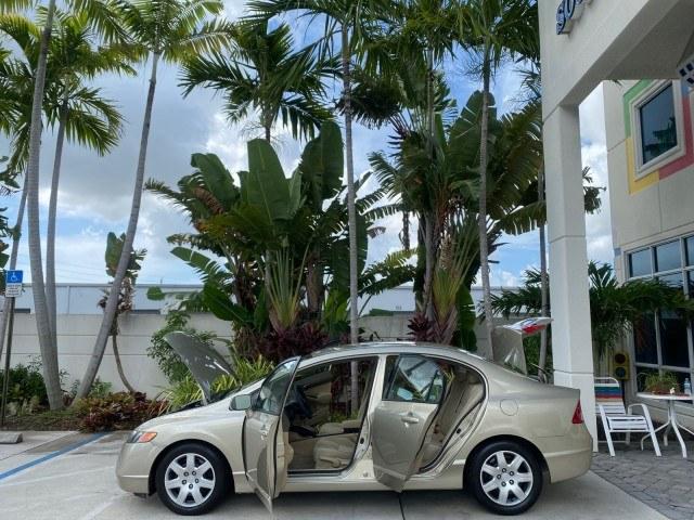 2007 Borrego Beige Metallic /Ivory Honda Civic Sdn LX LOW MILES 24,174 1 OWNER (1HGFA16547L) with an 1.8L SOHC MPFI 16-Valve i-VTEC I4 Engine engine, Automatic transmission, located at 4701 North Dixie Hwy, Pompano Beach, FL, 33064, (954) 422-2889, 26.240938, -80.123474 - OUR WEBPAGE FLORIDACARS1.COM HAS OVER 100 PHOTOS AND FREE CARFAX LINK 2007 Honda Civic LX 1 OWNER Sedan 4 DR 1.8L I4 F SOHC 16V Gasoline Front wheel drive Features ABS Brakes Air Conditioning AM/FM Stereo Automatic Transmission Auxiliary Audio Input CD Audio Cloth Seats Cruise Control Power Locks Po- Photo#8